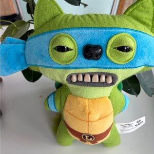 Lively Green and Blue Stuffed Animal